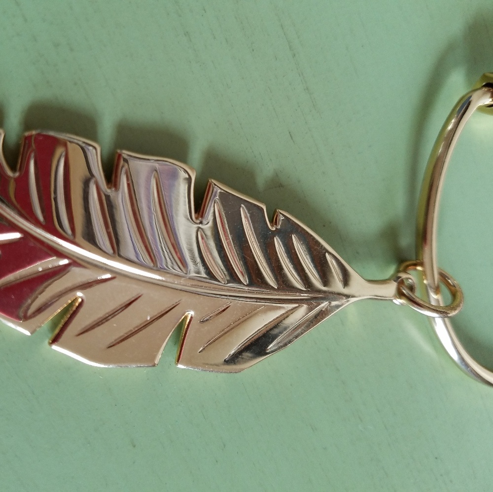 Feather charm
